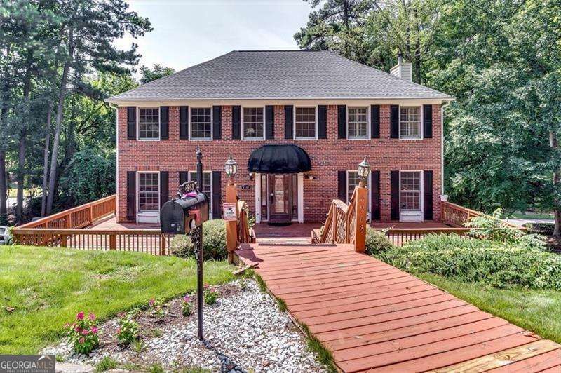 Property Photo:  6963 Whispering Oaks Court  GA 30087 
