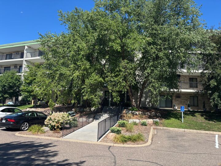 Property Photo:  10521 Cedar Lake Road 411  MN 55305 
