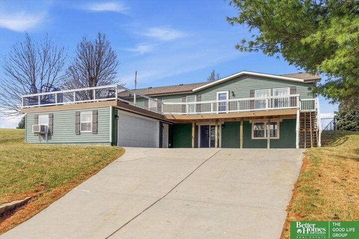 Property Photo: 9307 Clubhouse Circle NE 68048-0000