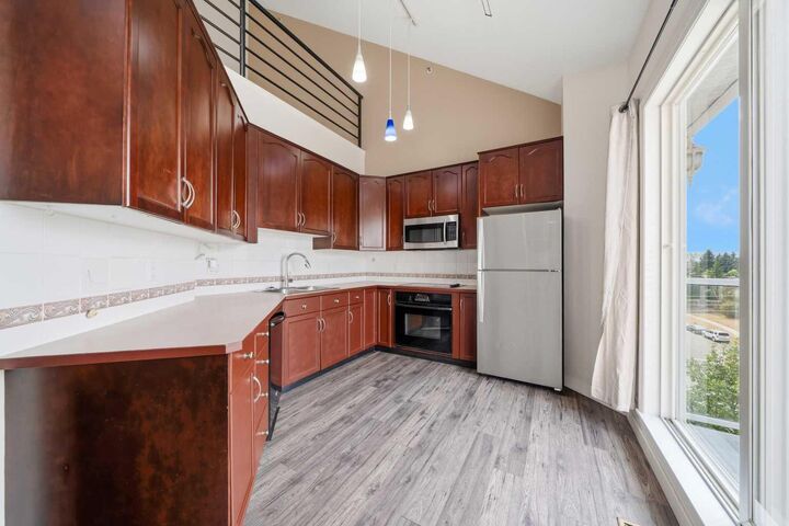Property Photo: 6550 Old Banff Coach Road SW 114 AB T3H 4J4