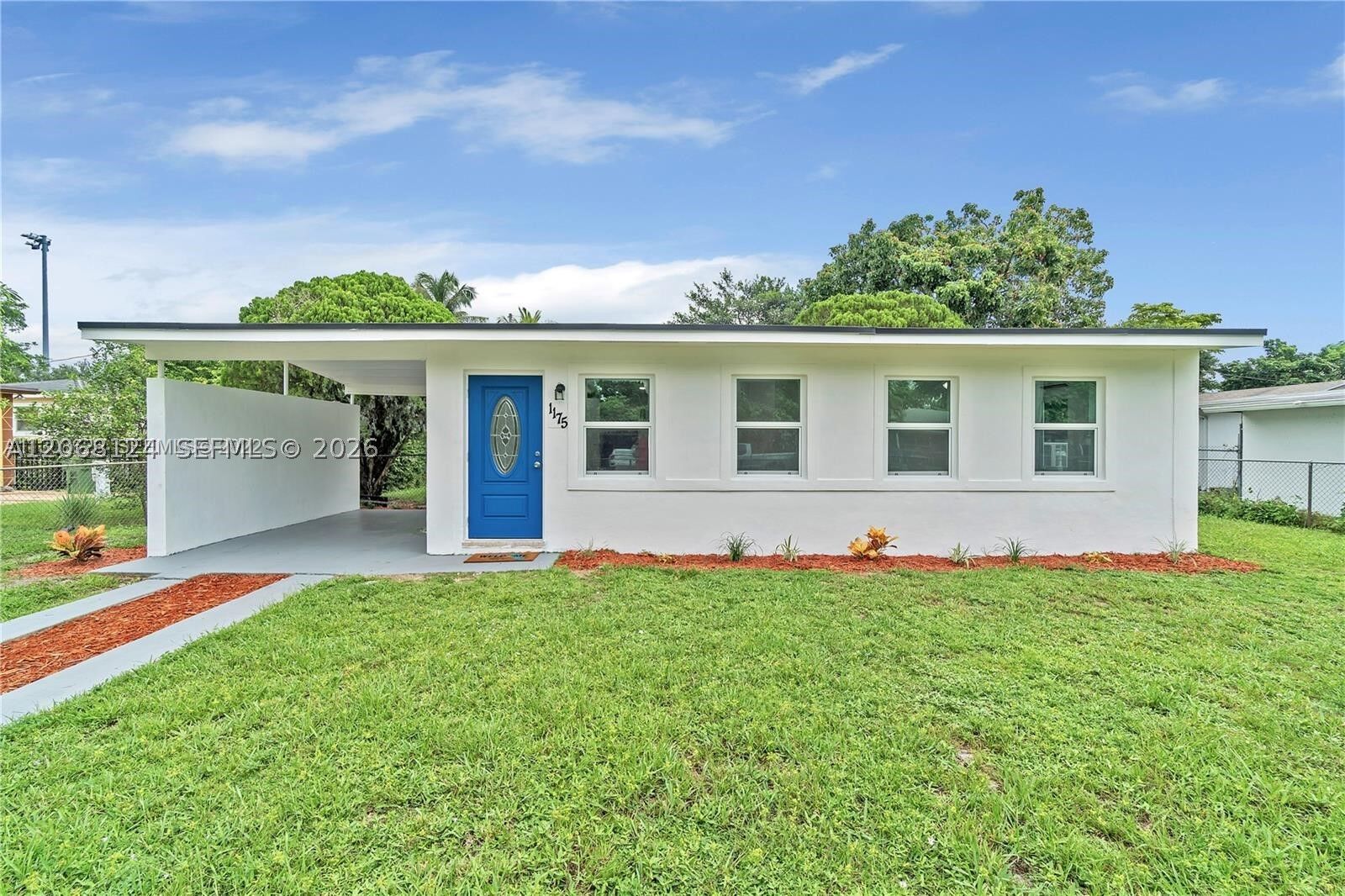 Property Photo: 1175 NW 133rd St FL 33168