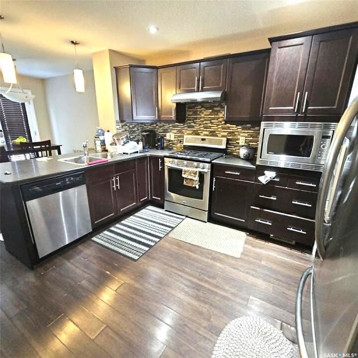 Property Photo:  5008 Aerial Crescent  SK S4W 0C9 
