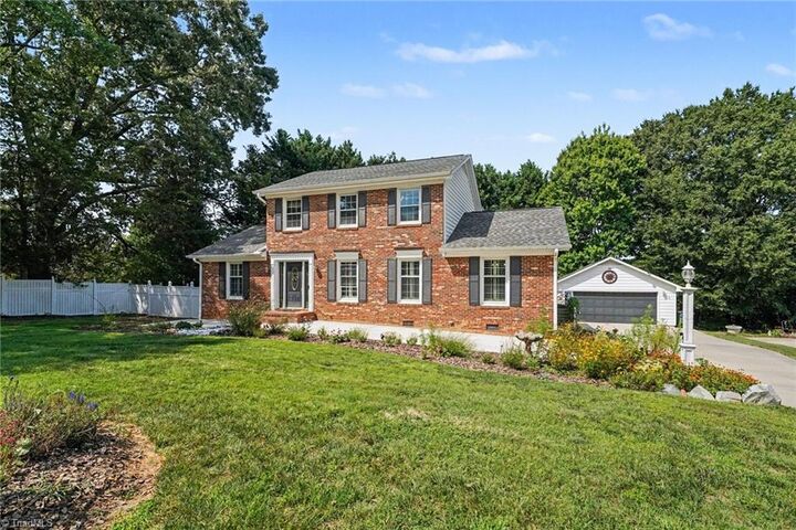 Property Photo:  5802 Muirfield Drive  NC 27410 