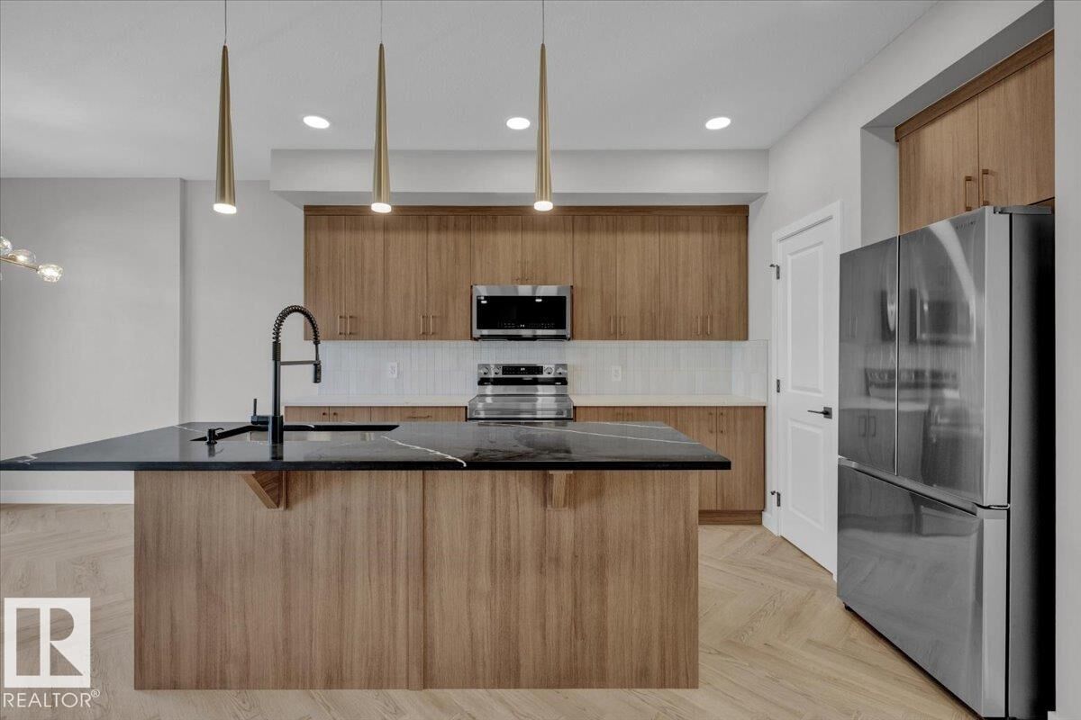 Property Photo:  8308 Kiriak Loop SW  AB T6W 5S2 