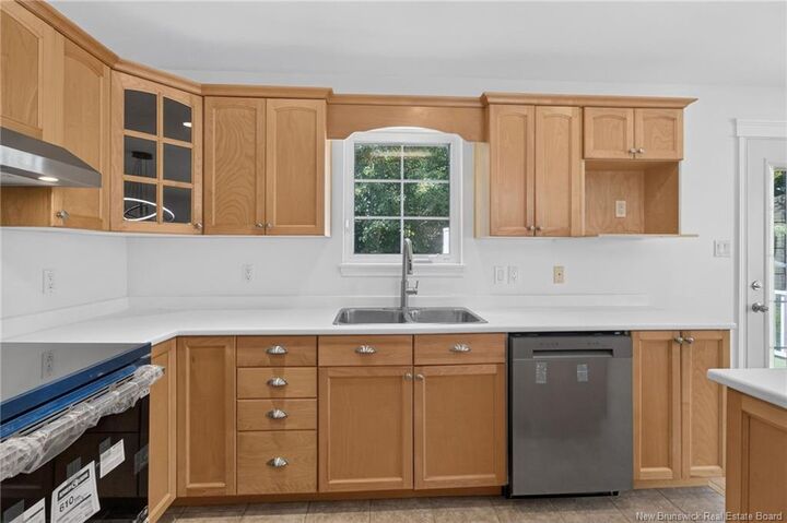 Property Photo:  302 Lonsdale Drive  NB E1G 0A8 