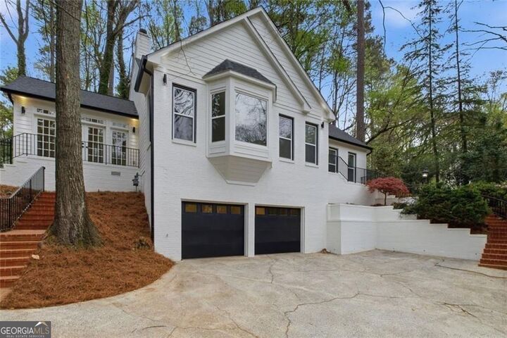 Property Photo: 7170 Riverside Drive NW GA 30328