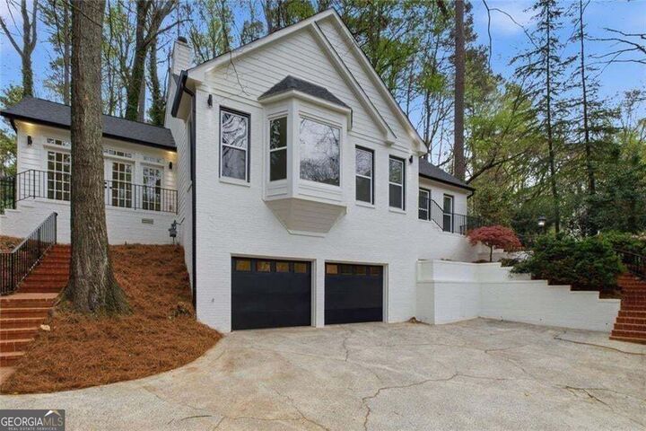 Property Photo:  7170 Riverside Drive NW  GA 30328 