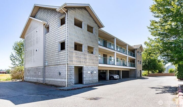 Property Photo:  9735  272nd Place NW 510  WA 98292 