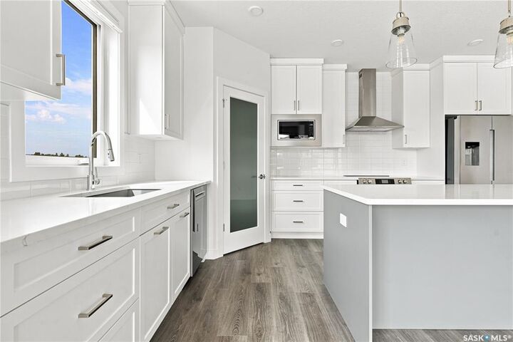 Property Photo: 3589 Evans Court 216 SK S4S 0A9