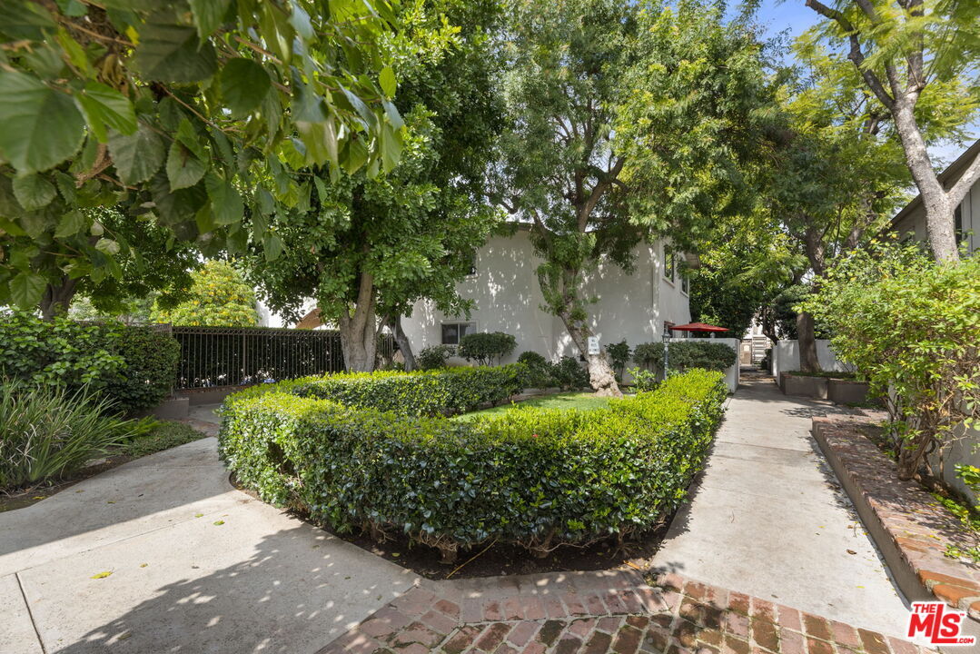 Property Photo:  18555 Collins St, Unit C11  CA 91356 