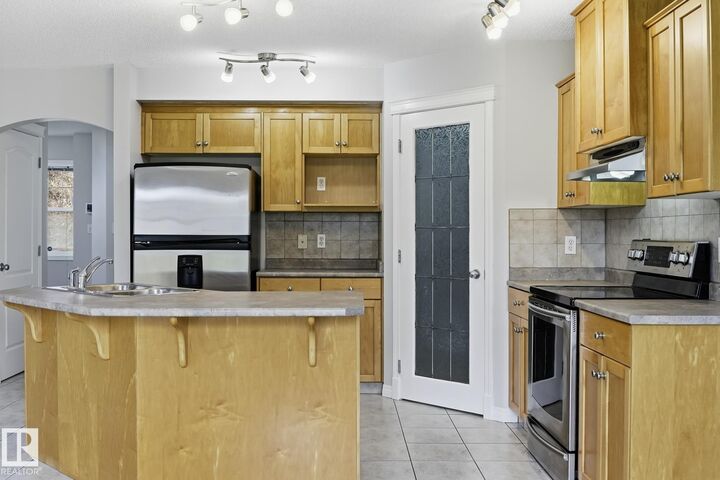 Property Photo: 10719 8 Avenue SW AB T6W 1G4