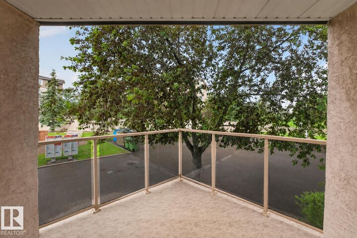 Property Photo:  10421 42 Avenue NW 105  AB T6A 7C8 
