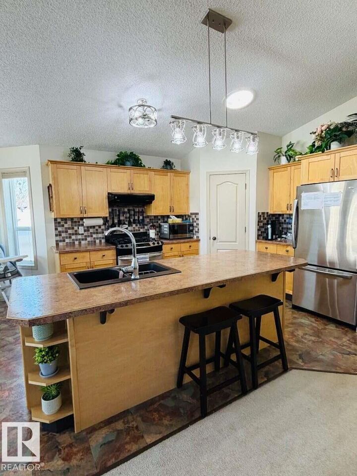 Property Photo: 5004 53 Street AB T0A 0K0