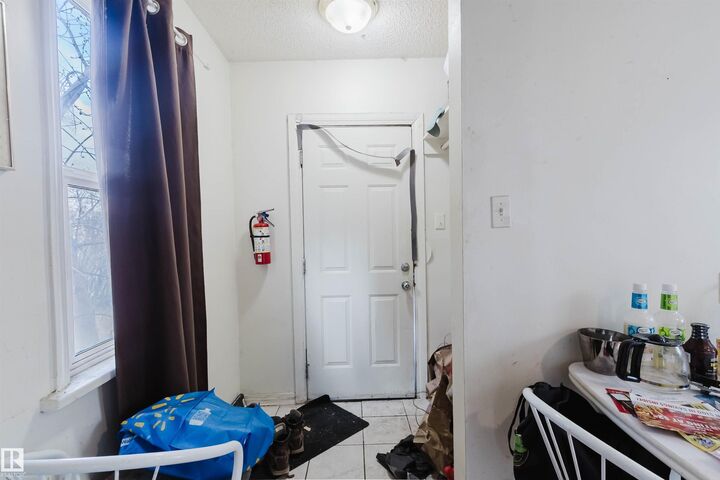 Property Photo:  12223 127 Street NW  AB T5L 0Z7 