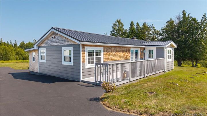 Property Photo:  114 Canal Road  NB E5C 1K1 