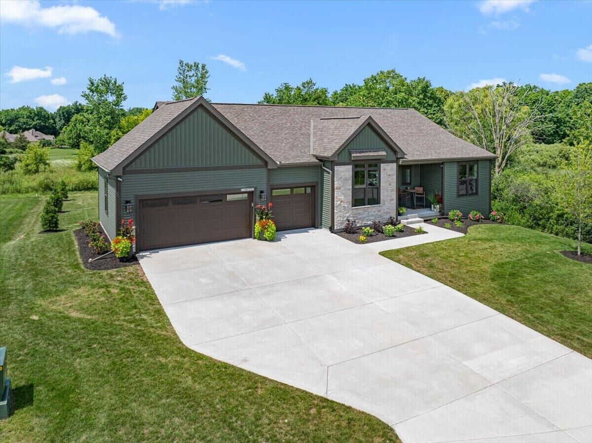 Property Photo:  W194n15787 East Gate Ct  WI 53037 