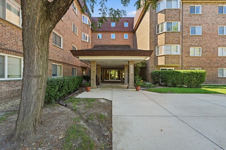 Property Photo: 220 S Roselle Road 524 IL 60193