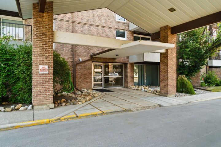 Property Photo:  202 Braeglen Close SW 2305  AB T2W 2B1 