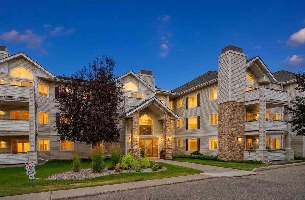 Property Photo:  7451 Springbank Boulevard SW 2114  AB T3H 4K5 