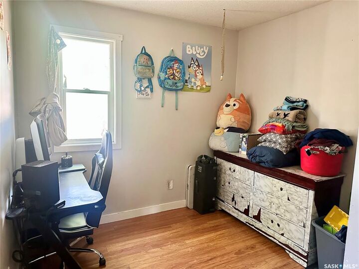 Property Photo:  1228 Robinson Street  SK S4T 2N2 