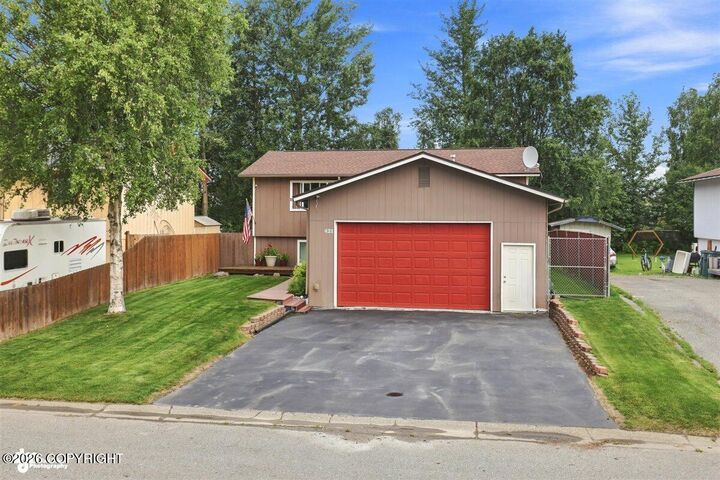 Property Photo: 421 W 91st Avenue AK 99515