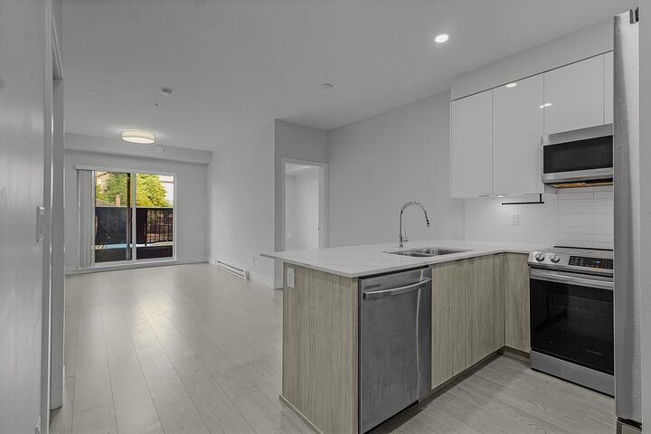 Property Photo: 5486 199A Street 110 BC V3A 0N6