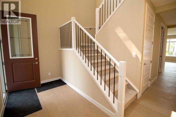 Property Photo:  127 Sundown Crescent  AB T4C 1Y3 