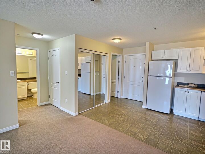Property Photo: 5350 199 Street NW 111 AB T6M 0A4