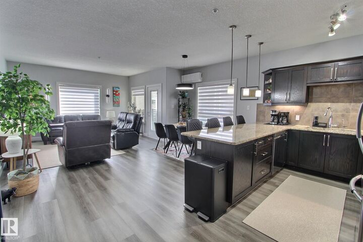 Property Photo:  7347 South Terwillegar Drive NW 3207  AB T6R 0M3 