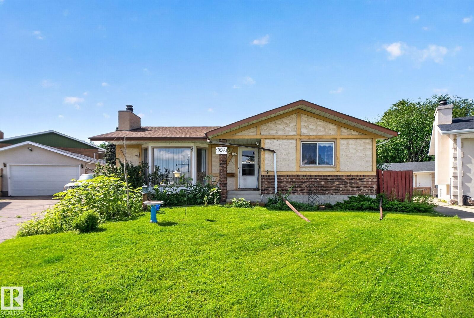 Property Photo:  13050 32A Street NW  AB T5A 3E5 