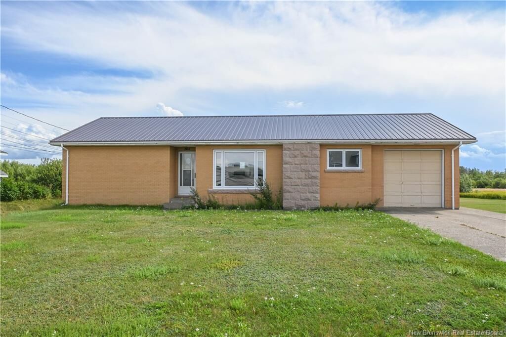 Property Photo:  301 Acadie Street  NB E8N 1J7 
