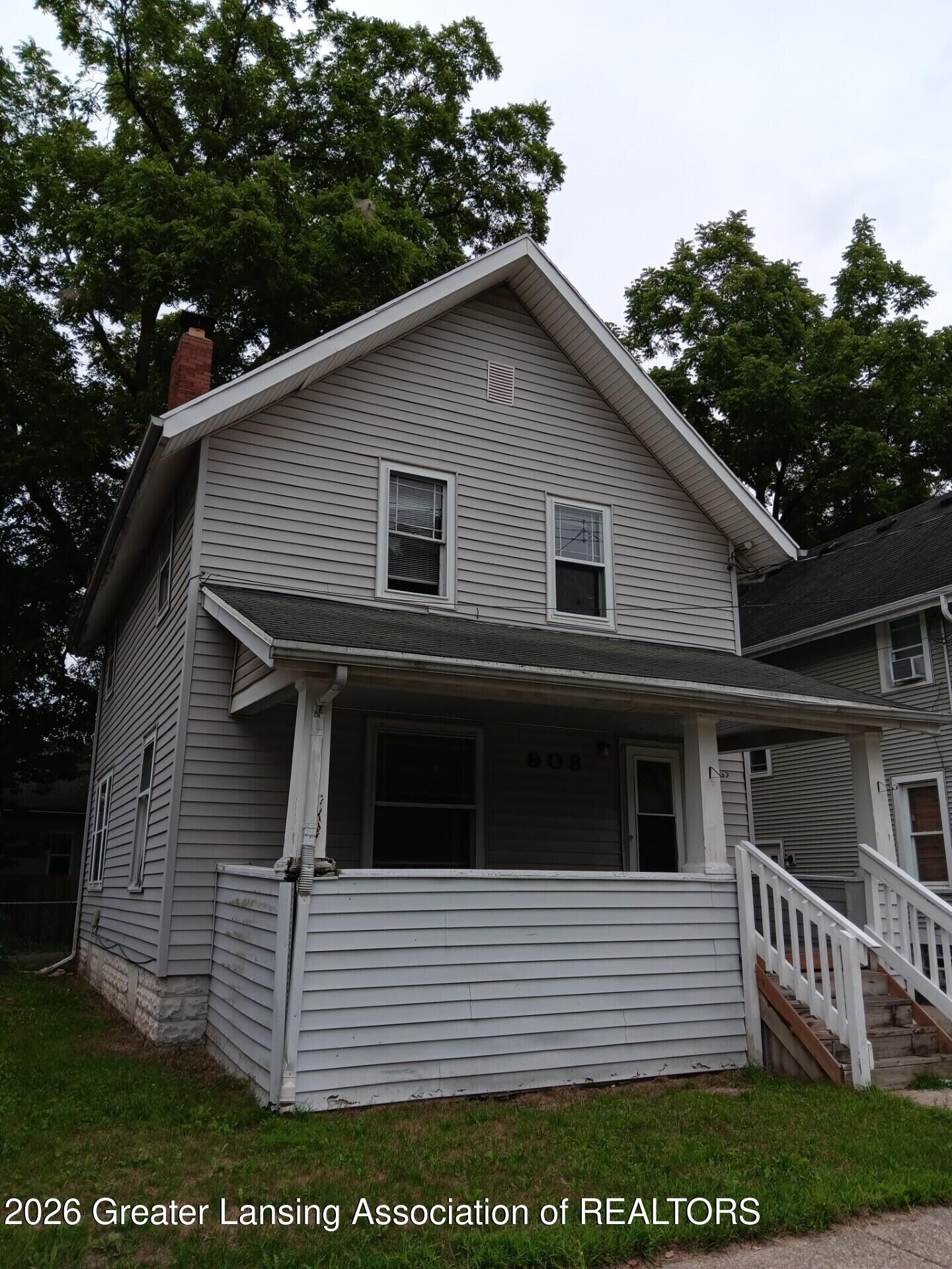 Property Photo:  908 N Pine Street  MI 48906 