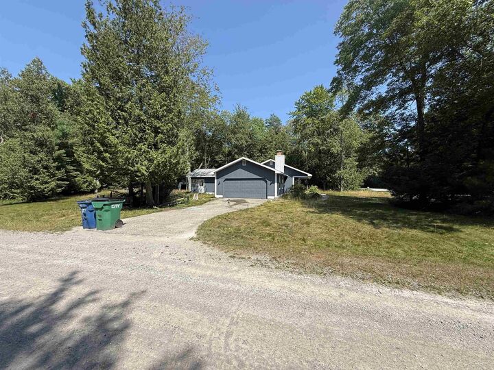 Property Photo: 4879 Kingswood Lane MI 48750