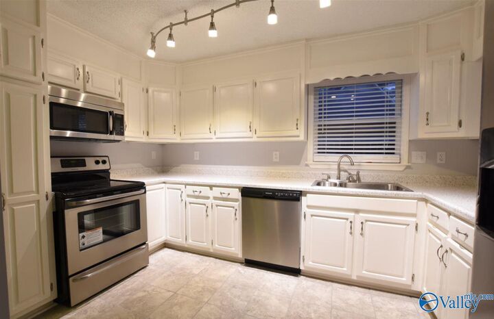 Property Photo:  1814 Whisperwood Way  AL 35806 