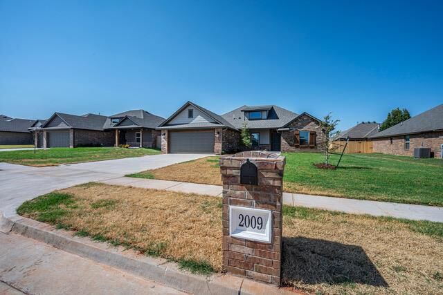 Property Photo: 2009 W Flintlock Way OK 73064