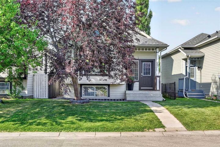Property Photo:  307 Covehaven View NE  AB T3K 5S4 