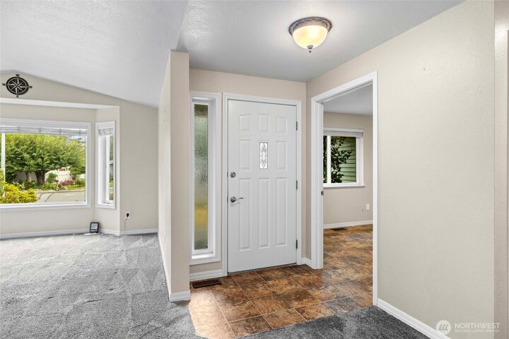 Property Photo: 4707 Glasgow Way WA 98221