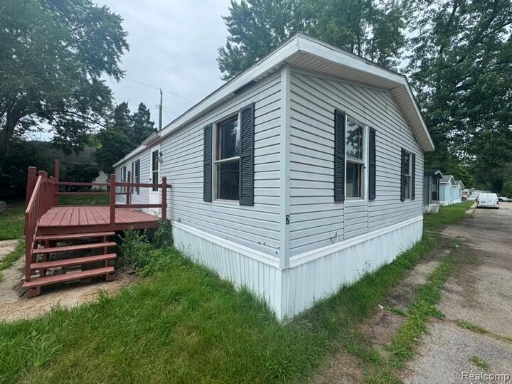 Property Photo: 2445 E Grand River Rd Lot #2 MI 48895