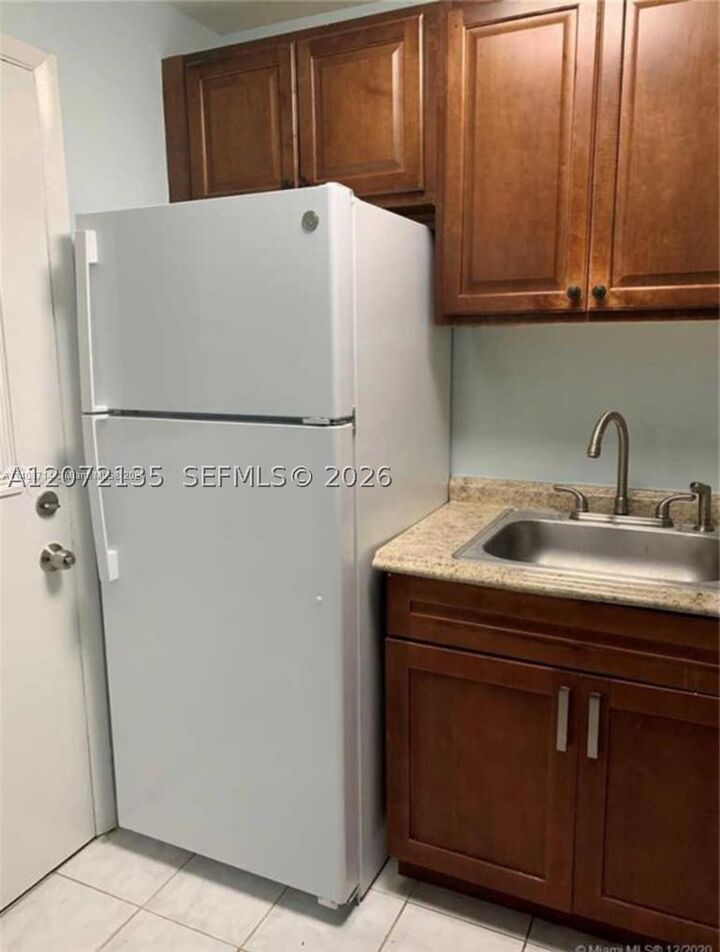 Property Photo:  241 SE 9th Ave 109  FL 33060 