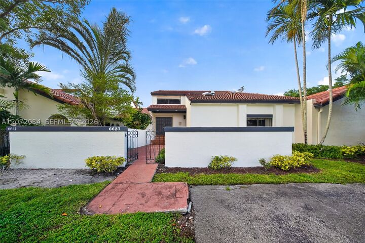 Property Photo: 6637 NW 181st Ln FL 33015