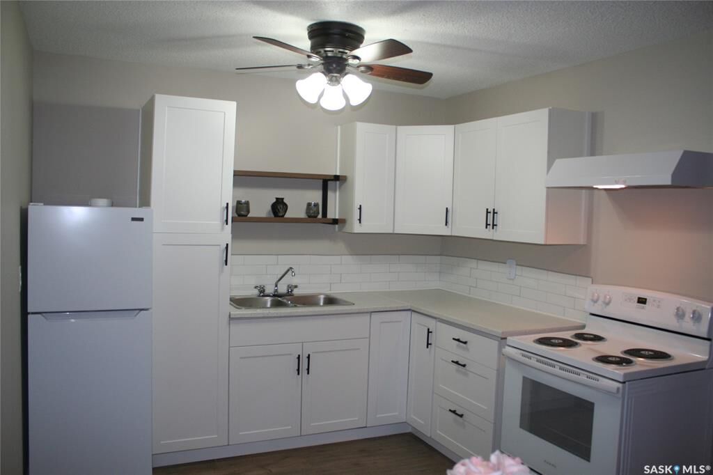 Property Photo: 4505 Rae Street 6 SK S4S 3B2