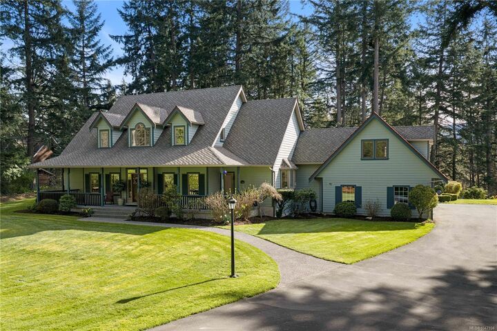 Property Photo: 1228 Garden Gate Dr BC V8M 2H6
