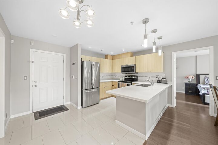 Property Photo: 12083 92A Avenue 207 BC V3V 8C8