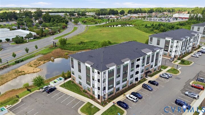 Property Photo:  3900 Maze Runner Drive 403  VA 23112 