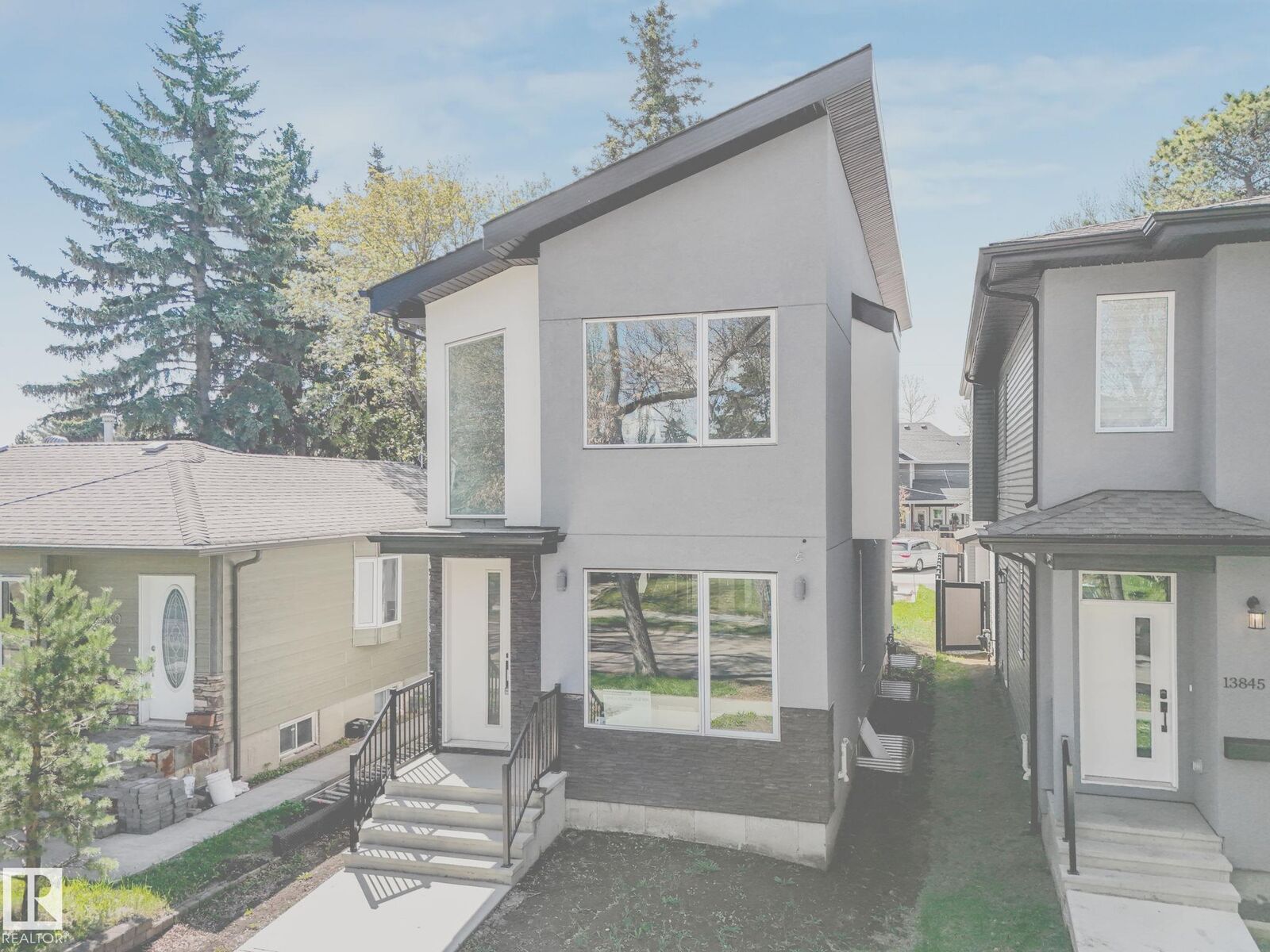 Property Photo: 13843 110A Avenue NW AB T5M 2N1