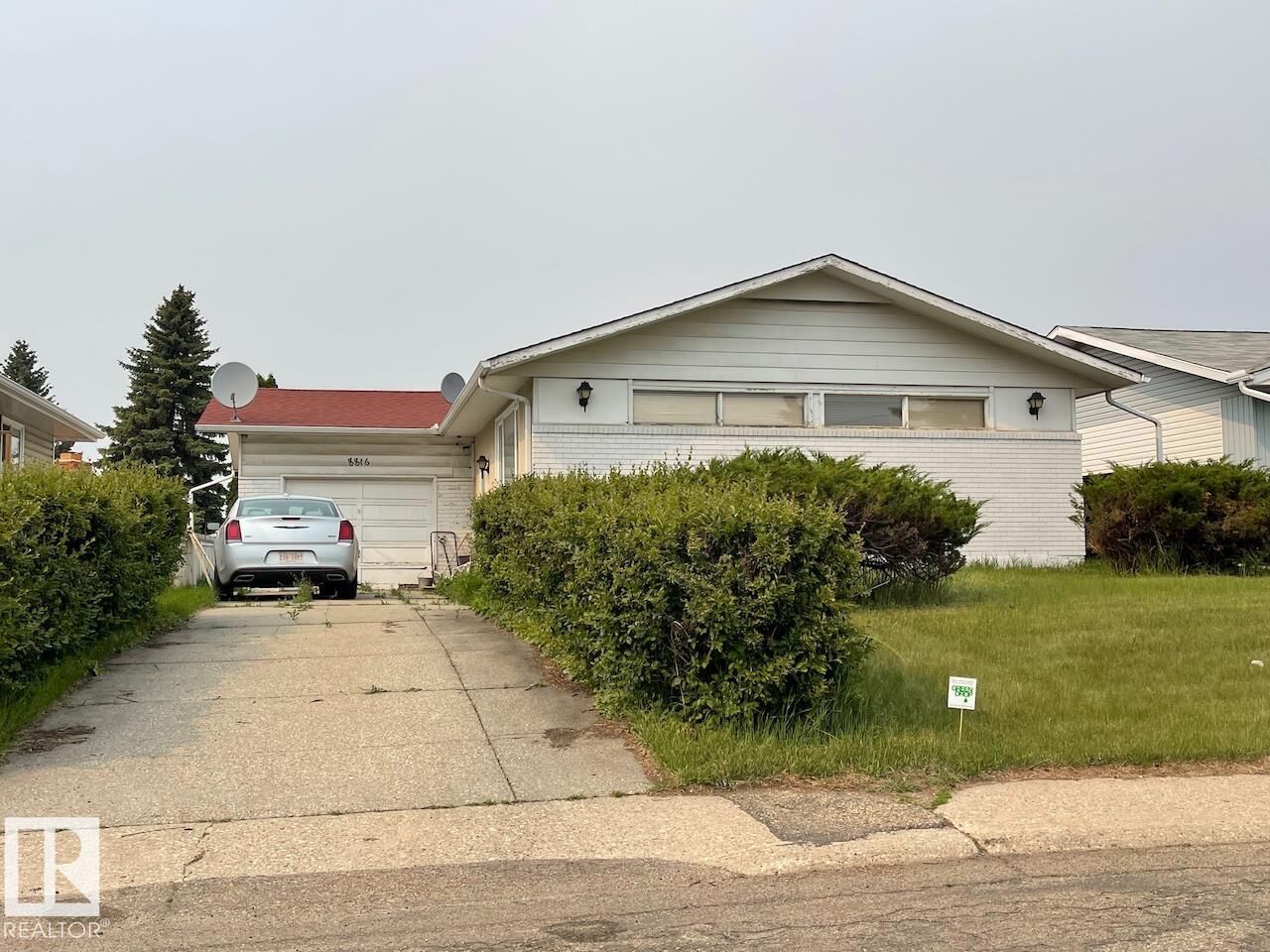 Property Photo:  8816 137 Avenue NW  AB T5E 1Y4 