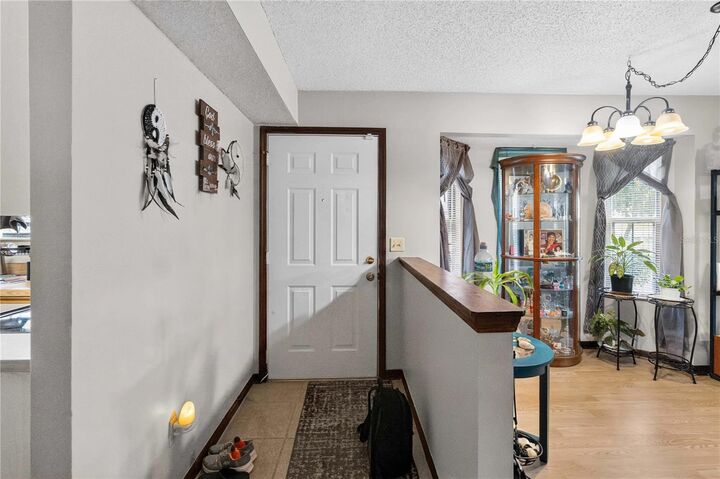 Property Photo:  4807 Coachmans Drive 2402  FL 32812 
