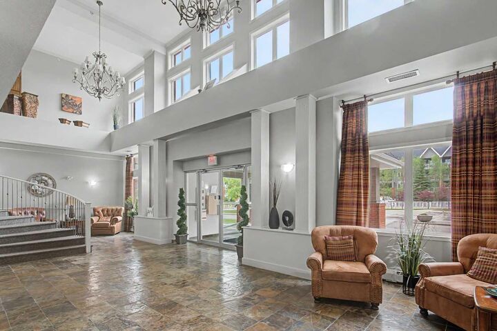 Property Photo:  15 Everstone Drive SW 205  AB T2Y 5B5 