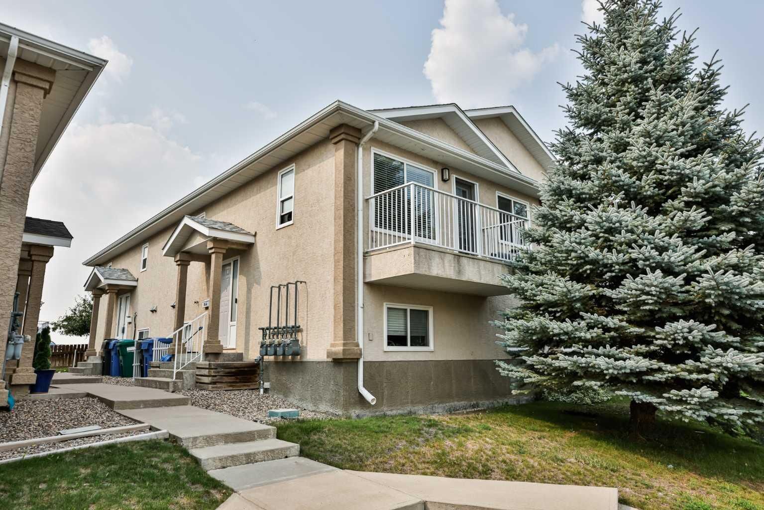 Property Photo: 304 Highlands Boulevard W 4 AB T1J 4X7