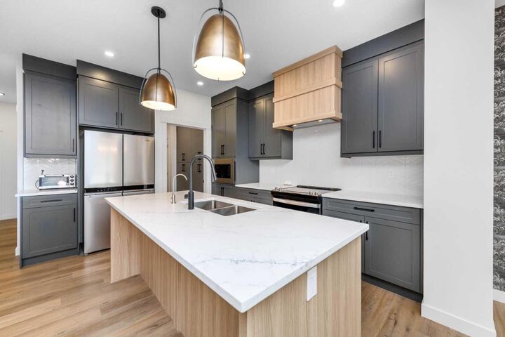Property Photo: 124 Heritage Boulevard AB T4C 3G8